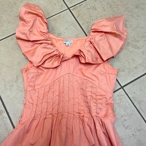 A orange blouse really cute runs small! Can pair with jeans/ jean shorts!!!